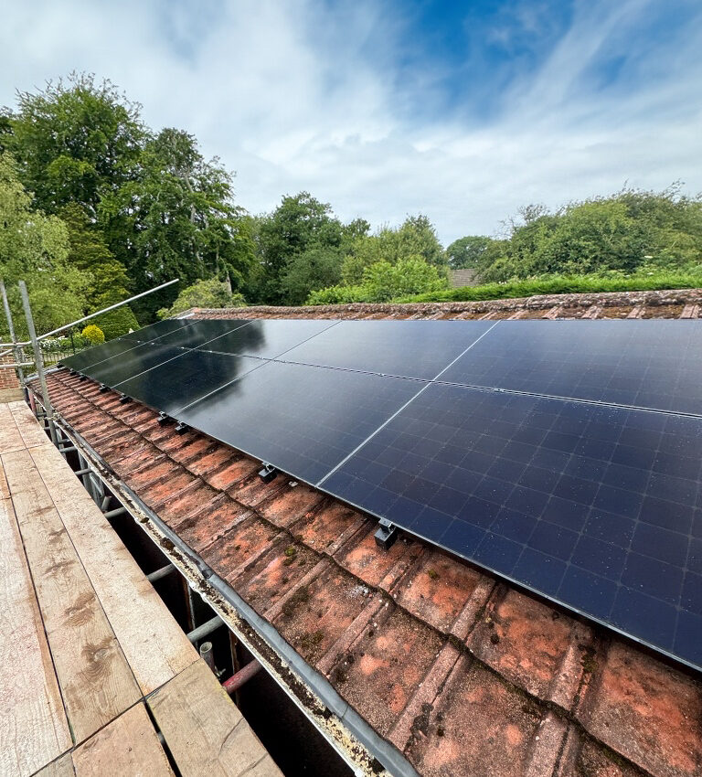 Solar panels being installed on a roof